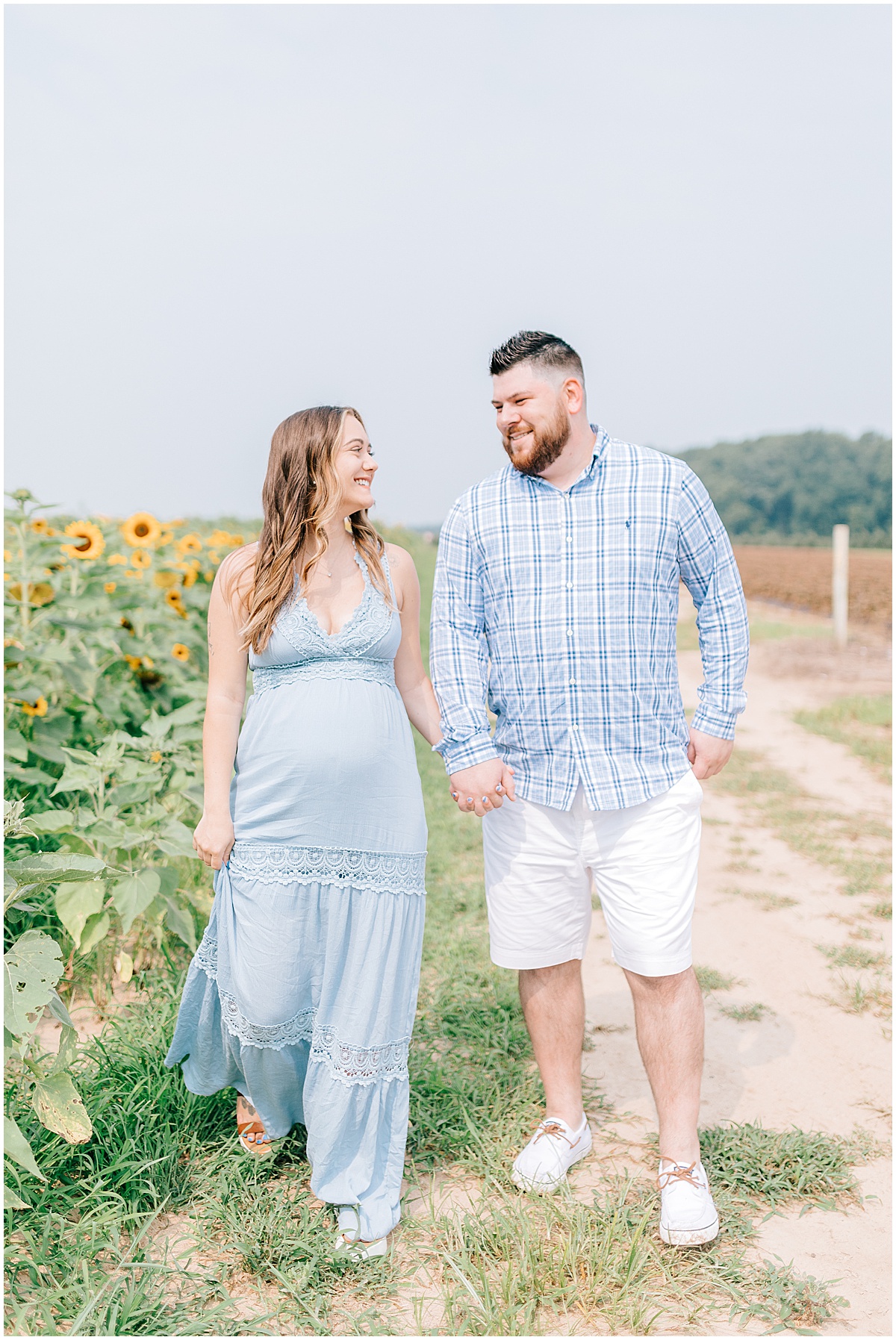 sunflower field maternity portraits